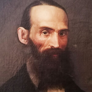 Dipinto ad olio su tela del 1800: gentiluomo con sguardo austero, occhi penetranti, barba incolta, giacca e panciotto eleganti, raffigurato di tre quarti, dettaglio